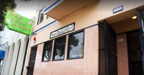 Exterior of Tommy's Mexican Restaurant, featuring a green sign and tiled entrance, located at 5929.