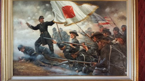 A historical painting depicting a Civil War battle scene with soldiers, flags, and smoke.