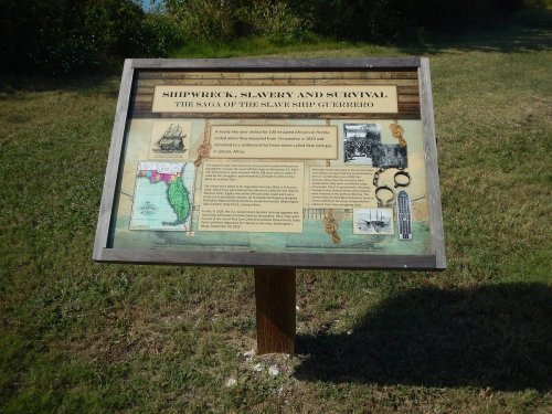 Sign about the shipwreck of the slave ship Guerrero, detailing its history and significance in slavery and survival.