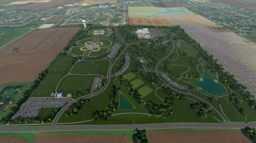Aerial view of a large park with winding paths, ponds, and green spaces, surrounded by fields and urban development.
