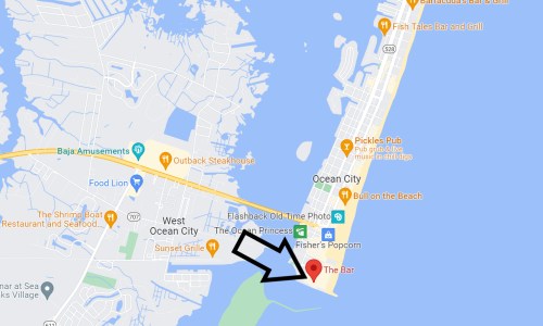 Map showing Ocean City with a marked location for "The Bar" near the beach, highlighted by an arrow.