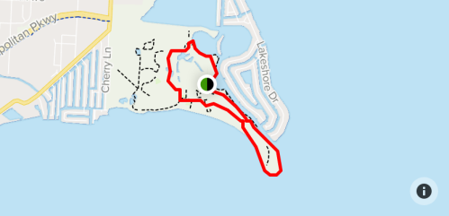 Map showing a red route along a waterfront area, with paths and streets outlined in black.