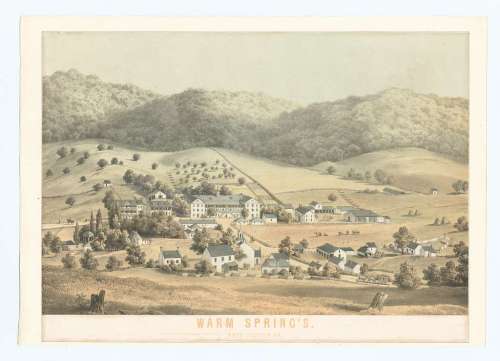 A scenic view of Warm Springs, featuring rolling hills, buildings, and a rural landscape.