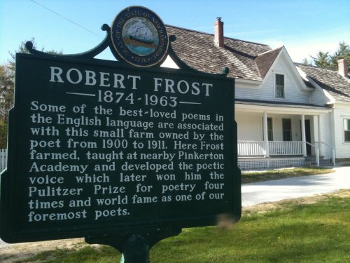 Historical marker about Robert Frost, detailing his life and achievements at his former farm from 1900 to 1911.