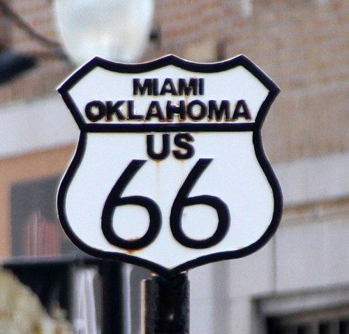Sign for US Route 66 in Miami, Oklahoma, featuring a classic shield design.