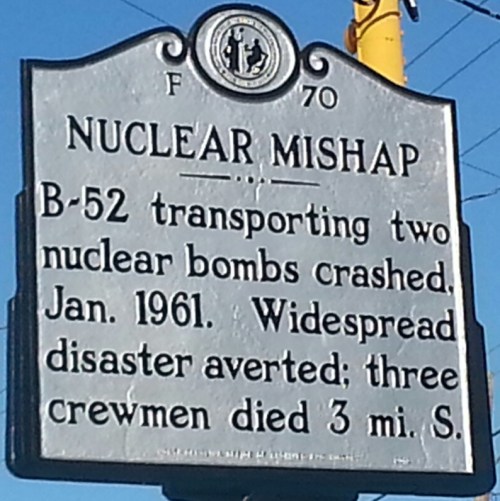 Historical marker detailing a B-52 crash in January 1961, involving two nuclear bombs and resulting in three crew deaths.