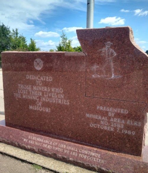 A granite memorial dedicated to miners who lost their lives in Missouri's mining industries, presented by Mineral Area Elks.
