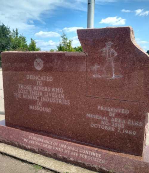 A granite memorial dedicated to miners who lost their lives in Missouri's mining industries, presented by Mineral Area Elks.