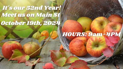Celebrating 52 years! Join us on Main St, Oct 19, 2024, from 9am-4pm. Apples and autumn leaves in the background.