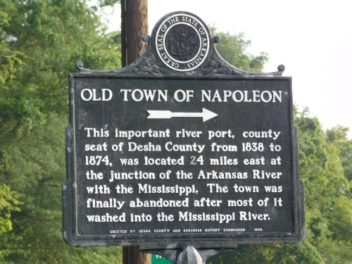 Sign marking the Old Town of Napoleon, detailing its history as a river port and its abandonment.