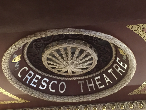 Ceiling detail of the Cresco Theatre featuring ornate design and the name "CRESCO THEATRE" in decorative letters.