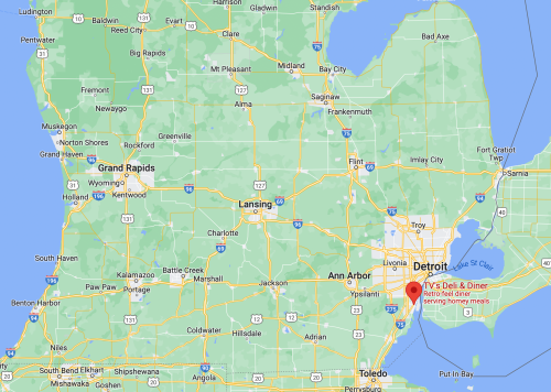 Map of Michigan highlighting major cities like Detroit, Grand Rapids, and Lansing, with roads and geographical features.