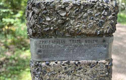 Signpost indicating directions for the Appalachian Trail, including Little Stony Man and Skylight Lodge.