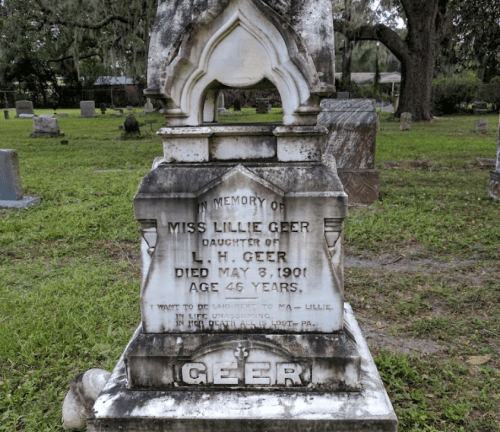 A weathered gravestone for Miss Lillie Geer, daughter of L.H. Geer, who died on May 8, 1901, aged 46 years.
