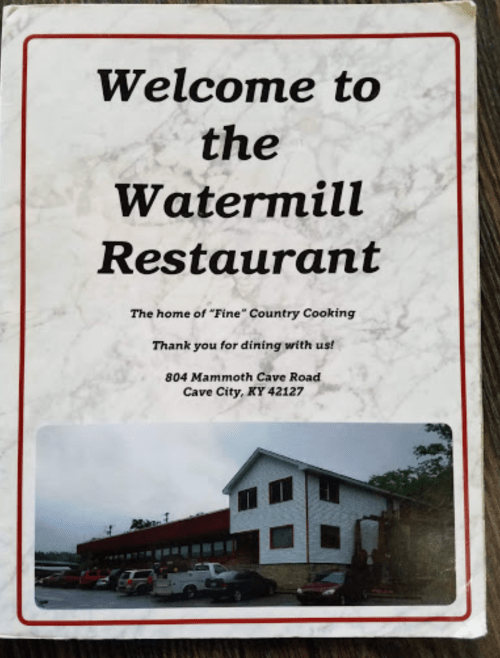 Menu cover for Watermill Restaurant, featuring a marble background and text welcoming guests to enjoy country cooking.