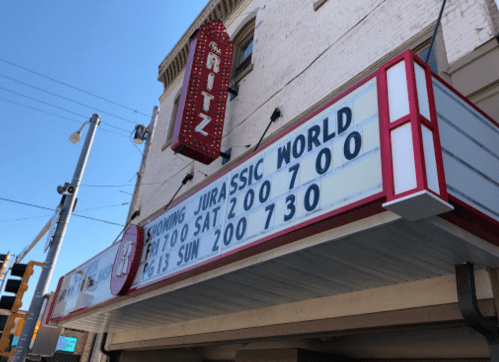 Marquee of the Ritz theater displaying showtimes for "Jurassic World" on Friday, Saturday, and Sunday.