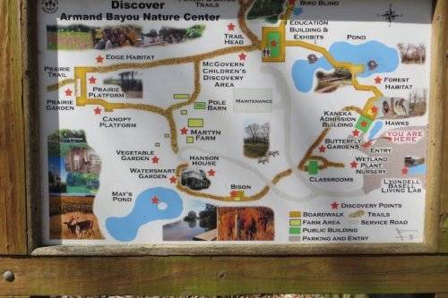 Map of Armand Bayou Nature Center showing trails, gardens, and key locations like the education building and bison area.