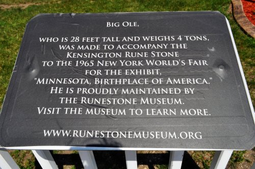 Sign about Big Ole, a 28-foot tall, 4-ton statue, promoting the Runestone Museum and the 1965 World's Fair exhibit.
