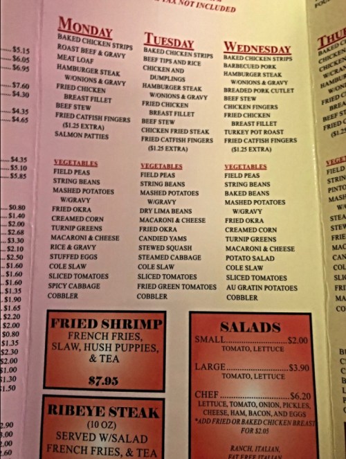 Menu featuring daily specials for Monday and Tuesday, including various meats, vegetables, and desserts.