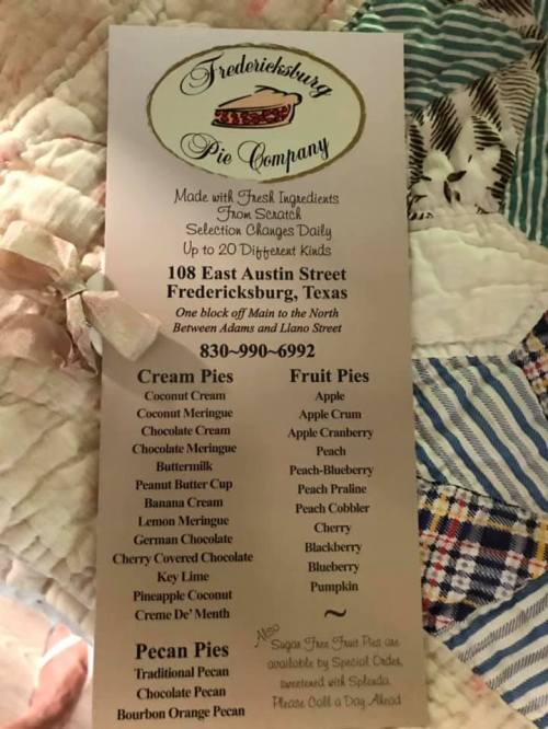 Menu for Fredericksburg Pie Company featuring various cream, fruit, and pecan pies with contact information and address.