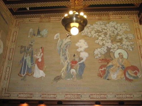 Mural depicting figures representing Hindu, Japanese, and Chinese cultures, surrounded by decorative elements.