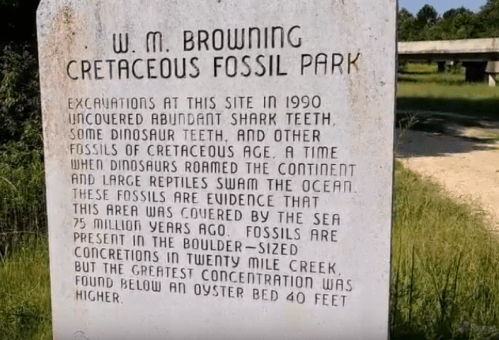 Sign at W.M. Browning Cretaceous Fossil Park detailing excavations and fossil findings from 1990.