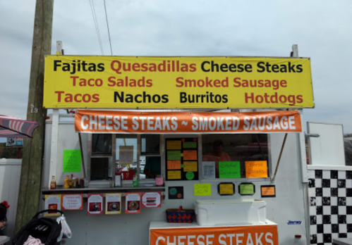 Food truck menu featuring fajitas, quesadillas, cheese steaks, tacos, nachos, burritos, hotdogs, and smoked sausage.