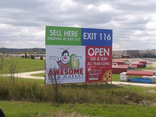 Billboard advertising Awesome Market and Dough King, with details on location and hours of operation.