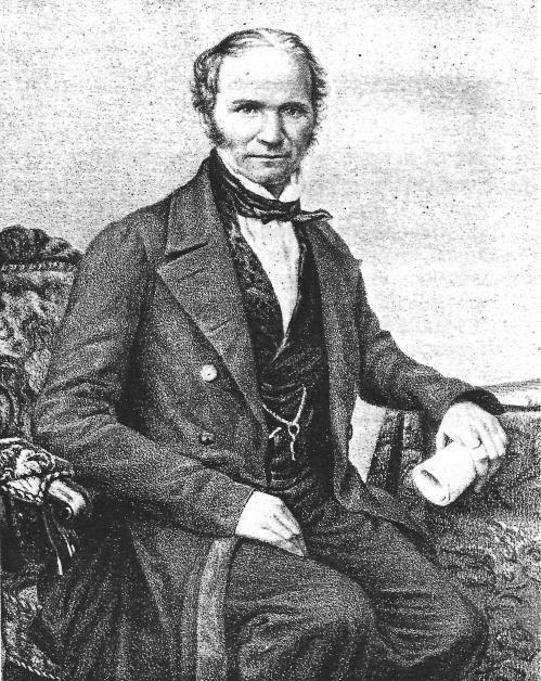A seated man in 19th-century attire, holding a cup, with a patterned chair in the background.