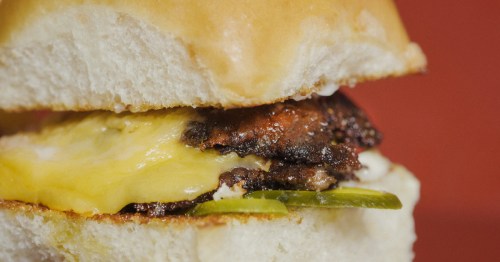 Close-up of a double cheeseburger served at Bud's Cafe and Bar in Colorado.