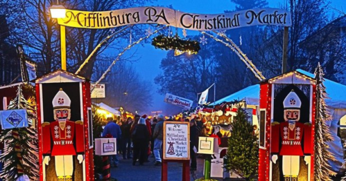 Entrance to the Mifflinburg PA Christkindl Market, decorated with festive lights and nutcracker figures.