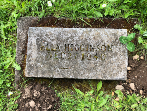 Gravestone of Ella Higginson, inscribed with her name and date of death, December 27, 1940, surrounded by grass.