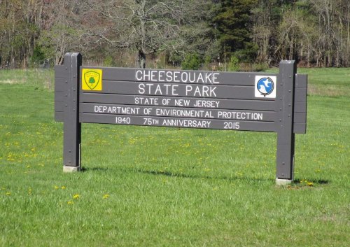 Sign for Cheesequake State Park in New Jersey, marking its 75th anniversary in 2015.
