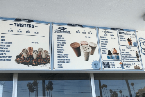 Menu board displaying ice cream options, including Twisters, Milkshakes, Sundaes, and Cones with prices listed.