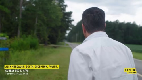A man in a white shirt walks away down a rural road, with promotional text for a true crime event on Oxygen.