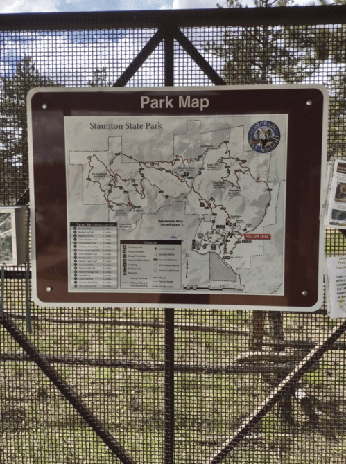 Map of Staunton State Park displayed on a sign, showing trails and park features.