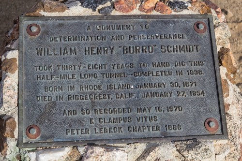 Plaque honoring William Henry "Burro" Schmidt for his 38-year effort to dig a half-mile tunnel, completed in 1938.