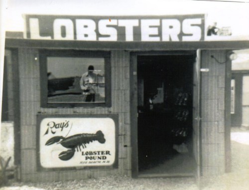 A vintage photo of Ray's Lobster Pound, featuring a sign with "Lobsters" and a lobster graphic on the storefront.