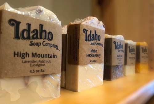 A display of Idaho Soap Company bars, featuring various scents like High Mountain and Idaho Huckleberry.