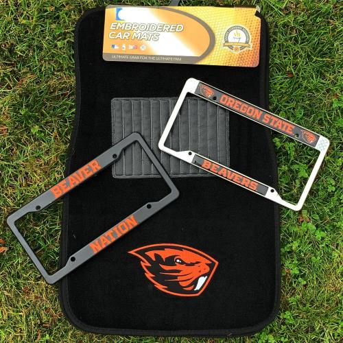 Two car license plate frames with "Beaver Nation" and "Oregon State Beavers" on a black car mat with an orange logo.
