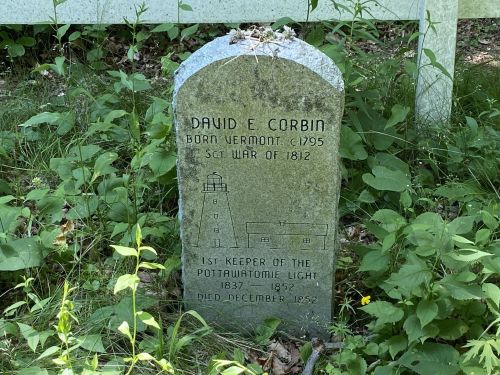 Gravestone of David E. Corbin, born 1795, a War of 1812 soldier and first keeper of Potawatomi Light, died 1952.
