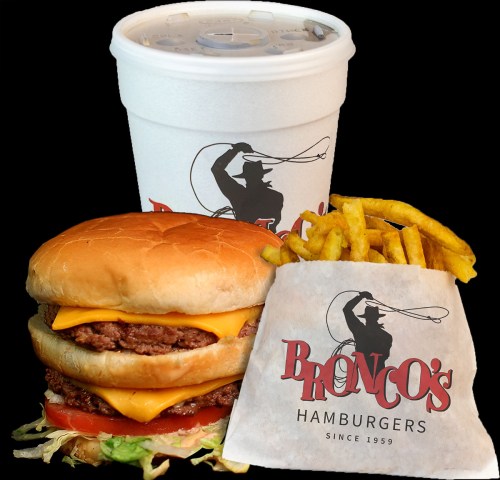 A burger with cheese, lettuce, and tomato, accompanied by fries and a drink, all from Bronco's Hamburgers.