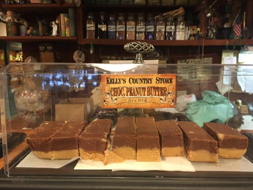 A display of chocolate peanut butter fudge in a clear container at Kelly's Country Store.