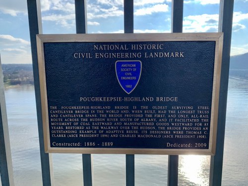 Image of a plaque detailing the Poughkeepsie-Highland Bridge, a historic civil engineering landmark, constructed 1886-1889.
