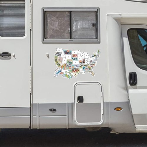 A close-up of an RV side featuring a colorful map of the United States with state names and illustrations.