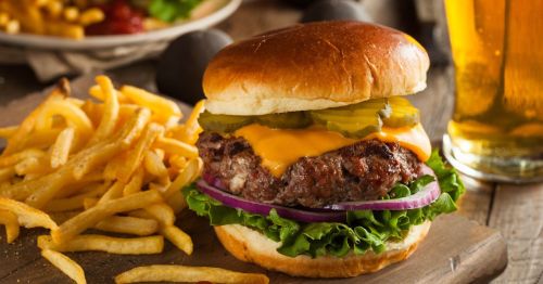 burger and fries in front of a cold glass of beer like the food served at bars in Vermont