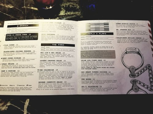 Menu page featuring various food items and prices, including chicken tenders, salads, and appetizers.