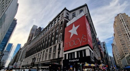 Macy's department store in New York City, featuring a large red star logo on the building's exterior.