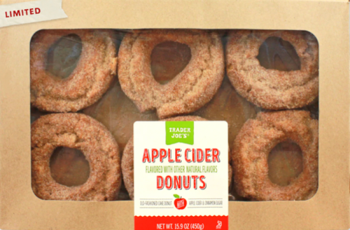 A box of Trader Joe's apple cider donuts, featuring six cinnamon-sugar coated donuts with a hole in the center.