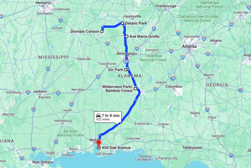Map showing a route from Mobile, Alabama, to various locations including Dismals Canyon and Huntsville, covering 422 miles.